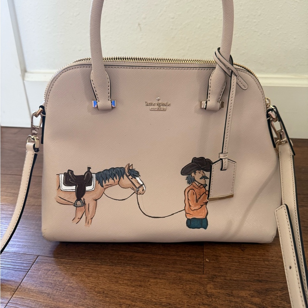 kate spade blush dome satchel with western cowboy and horse illustration